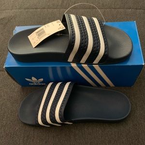 Navy blue adidas slides